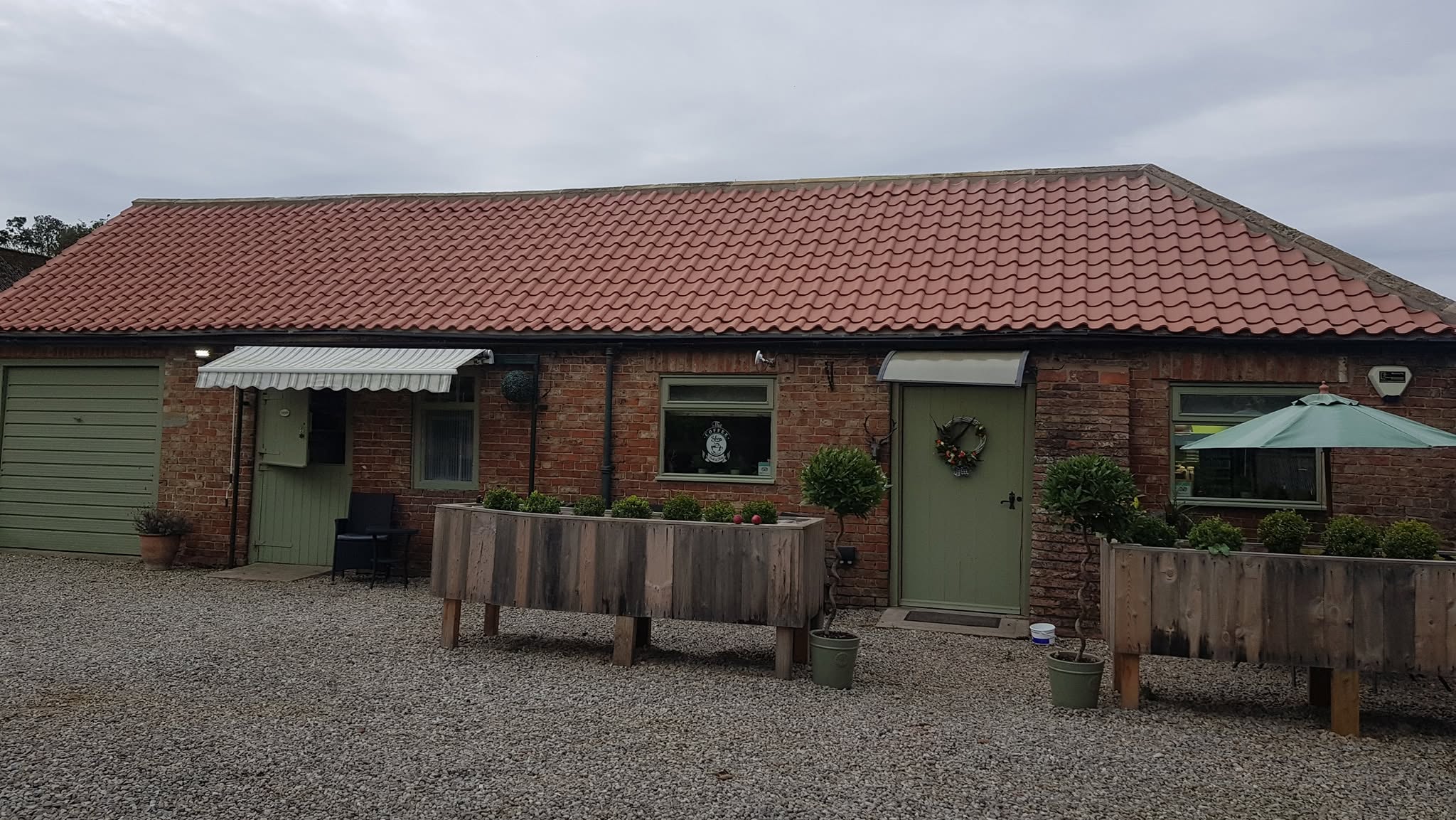 The converted brick farm building that houses The Farmhouse Bakery